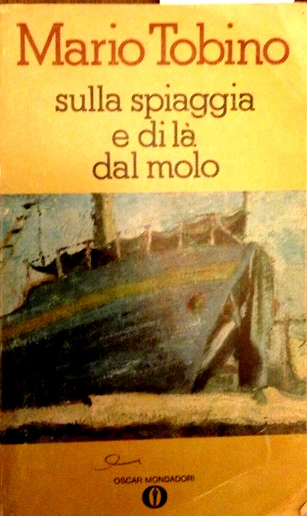 Sulla spiaggia e di là dal molo.